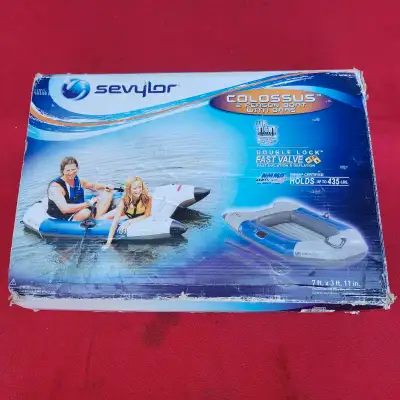 Sevylor brand new boat inflatable with oars in original packaging. Worth over $190