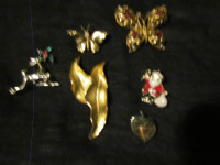 Beautiful gold-plated brooches, rings, and keychains for $5 doll