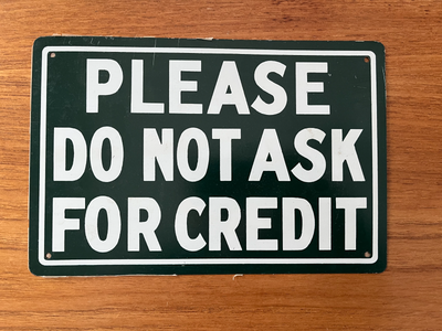"Please Do Not Ask For Credit" tin store sign, View more