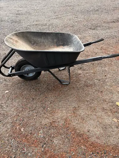 This contractor wheelbarrow is ready to haul whatever you need, from gravel to garden goodies. Pleas...