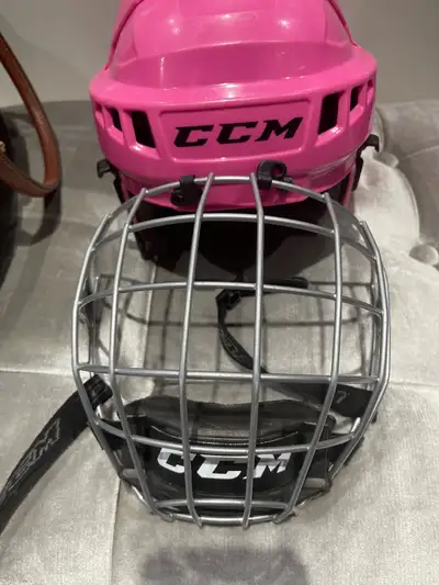 CCM size extra small hockey helmet with cage., View more
