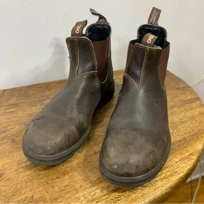 Stylish leather boots. Slip on design. Durable and comfortable. 50$