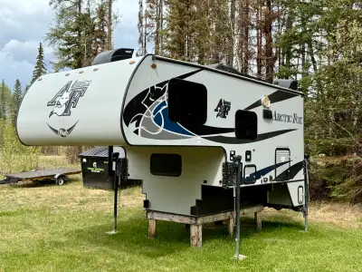 2020 Arctic Fox 990 25th Anniversary Special. Passenger side slide. 220 watts of solar installed. Du...
