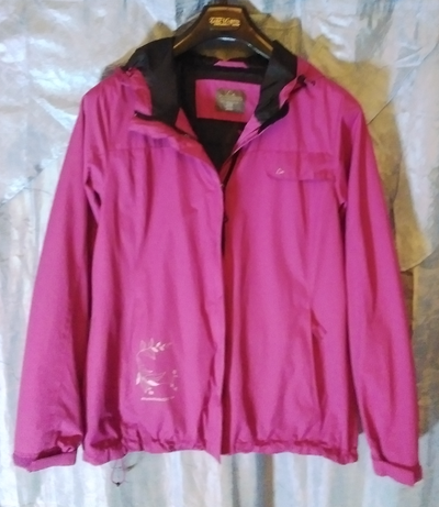 Selling one pink Paradox Woman's Everyday Rainwear Pink lightweight full ziper up Jacket 100% Nylon...