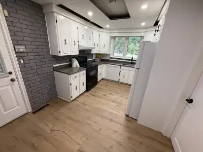 This room is available for rent in a home that features a kitchen and cozy bedroom. The house has ni...