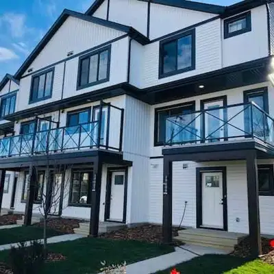 Executive end unit townhouse featuring 2 Master Bedrooms complete with 4 piece ensuites and large wa...