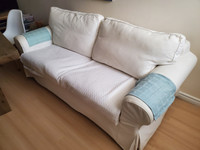 white sofa with pull out double bed