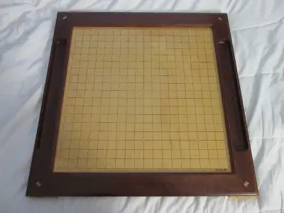 Asian style GO (Weiqi) Game Wood Board only, no pieces, but... Maybe you could use uncooked beans......