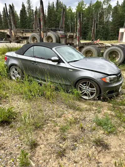 2012 bmw 135i convertible coupe. Low km. 55000km. I hit a deer so there is cosmetic damage to the fr...