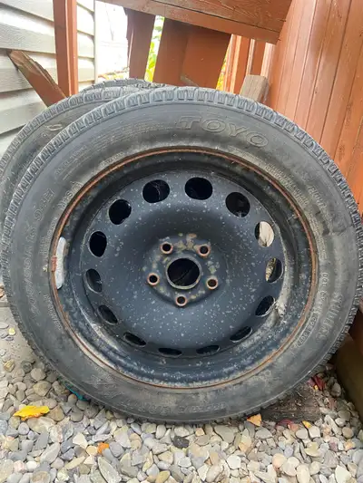 Selling a set of 4 Toyo Observe Garit KX winter tires mounted on 16-inch black steel rims. 150 OBO *...