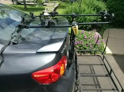 Unique bike rack in very good condition; pretty near impossible to find this rack now. Front tire co...