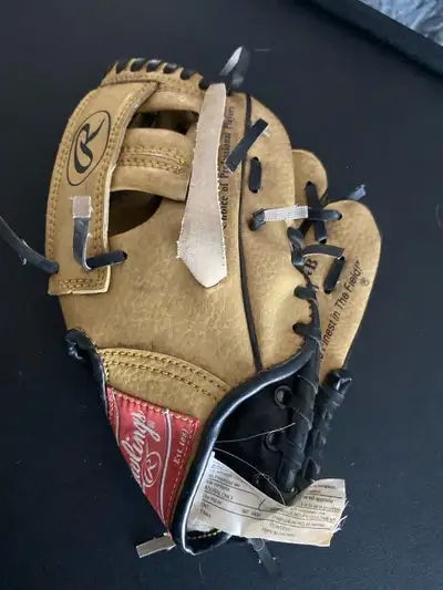 Small Rawlings Left hand baseball glove, View more