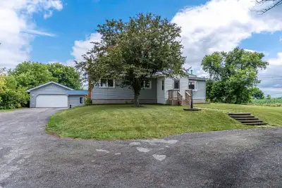 This beautifully maintained 3-bedroom, 2-bathroom bungalow offers the perfect mix of country living...