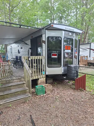 $45,000 including deck and shed, regular fridge and freezer, centra vac,furnace, air conditioning. E...