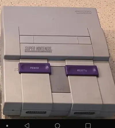 Super Nintendo console and controllers, View more