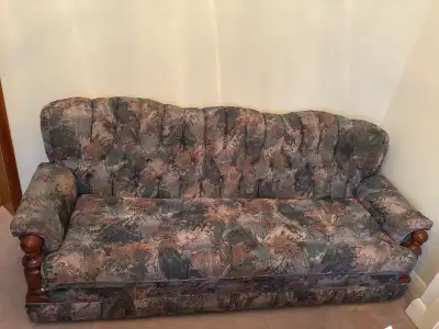 In good condition, large couch and side chair.. green and beige in colour.. traditional style