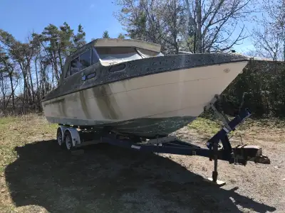 Late 70s Apollo Cabin Cruiser 233hp Merc Cruiser Would make a nice boat all fixed up Motor unknown a...