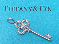Tiffany and Co.18k with diamond crown key pendant