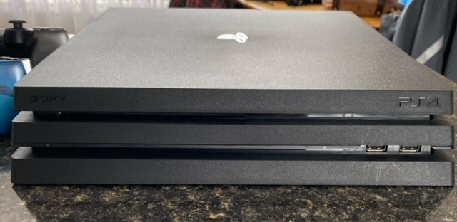 PS4 Pro in EXCELLENT Condition! 2 Controllers + 12 Games!! in Sony Playstation 4 in Fredericton - Image 4