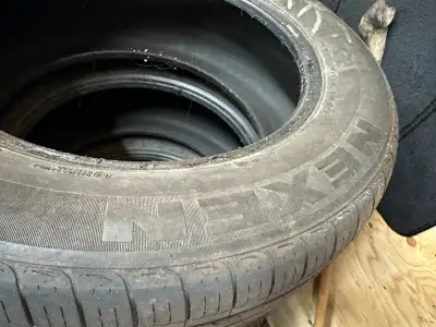 4 x Nexen (NOT Nokian) 235/60R18 103H All Season Tires. Lots of tread left.