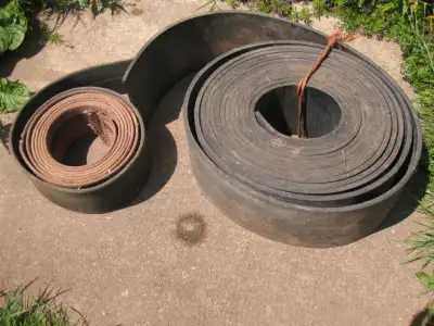 Belting- some webbed,some rubber.widths from 4" to 8" ,various lengths. Some fits vintage farm equip...