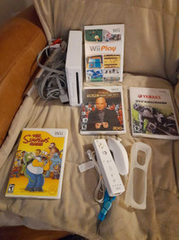 Nintendo Wii with 4 Good Games