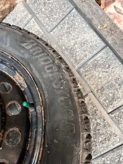 215/55r/16 Bridgestone Blizzaks bought one year ago last winter at Costco. Rims are older used on a...
