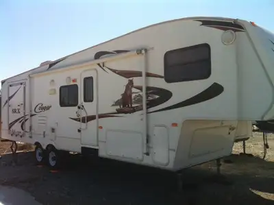 2 bedroom, kitchen area, toyhauler and bunky area large enough for a full size 2 up four wheeler, he...