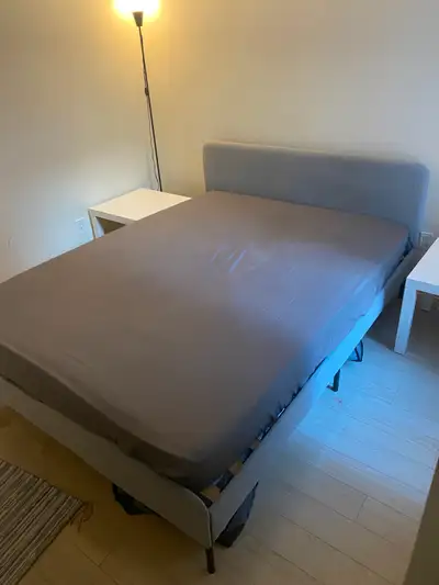 This IKEA SLATTUM Queen size upholstered bed frame is in good condition and ready to provide a styli...