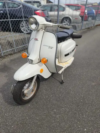 You dont see this ever. This scooter was bought new in Vancouver in 1975 for a meter maid company. T...