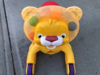 Child’s tiger toy with wheels