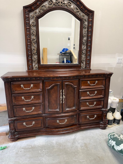 Bed frame (king size) and dresser with mirror. Can be sold separately.