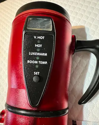 For sale is this smart tea/coffee tumbler. It was never used. As you can see through the imaged desc...