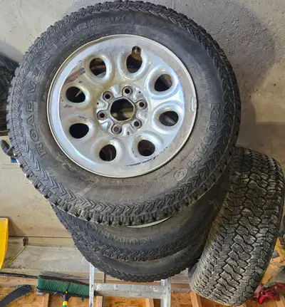 Got a set of four tires on rims that came off a 2009 GMC 1500 Sierra. Tires haven't been used for a...