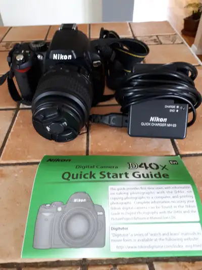 Whole set: $700 or individually priced as follows (see all pictures): Nikon D40X body and charger -...