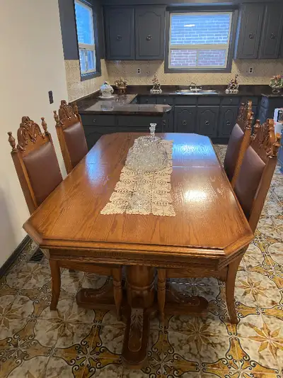 Kitchen table made of heavy wood with 4 chairs, View more