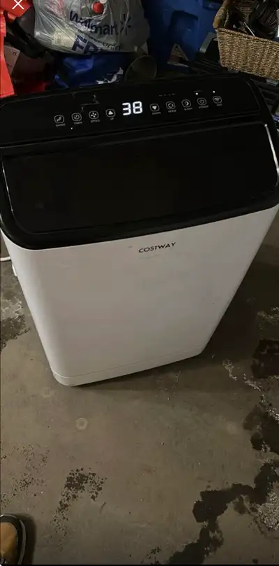 Stay cool this summer with this Costway portable air conditioner! This unit features a sleek design...
