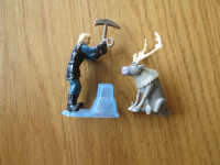 Frozen characters Kristoff and Sven cake topper and toy.