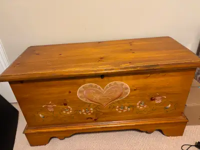 Medium tone wood base with Painted florals and heart design.