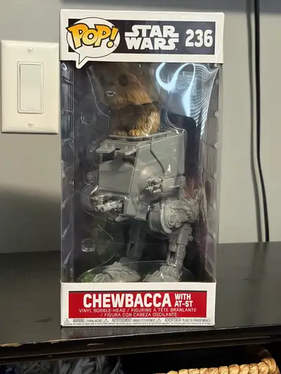 Add a piece of the galaxy to your collection with this Funko Pop! Star Wars #236, featuring Chewbacc...