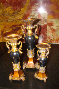 Set of three ornate Candleholders