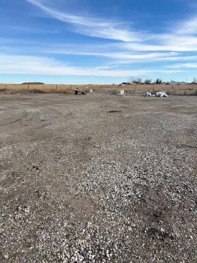 Secure, fully fenced Commercial Yard Space is available for rent in Southeast Calgary, ideal for equ...