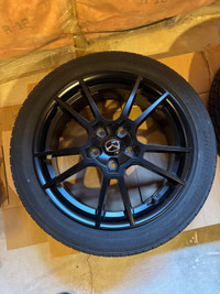 17x7 OEM Mazda rims and tires