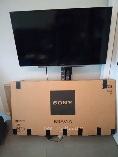 TV and stand, View more