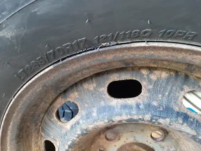 Winter studded snow tires with steel rims. 5 bolt pattern LT 265/70 R17