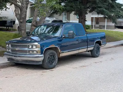 Great old truck. Has rust/dings/scratches but, in my opinion, it's still a great looking truck! 5.7...