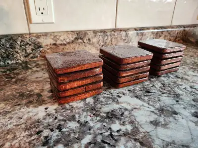 Hand made drink coasters, 20$ per pack of 5. These drink coasters have been sanded, stained, varnish...