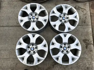 Oem set of staggered BMW rims off an X3. Bolt pattern 5x120 18x8 46mm offset front 18x9 51mm offset...