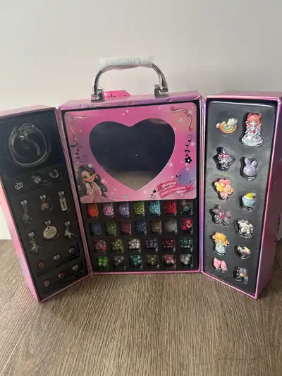 Girls Jewelry Designer set for ages 5+. It comes with a variety of beads and charms to make your own...