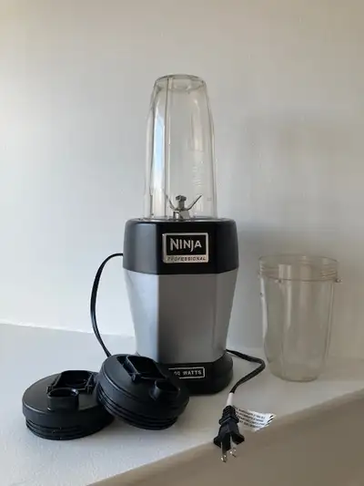 Ninja blender in excellent working condition with two containers, View more